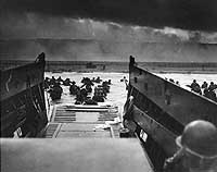 Photo # 26-G-2343:  Troops wade ashore on Omaha beach during the Normandy landings, 6 June 1944