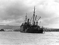 Photo # 80-G-19933: USS Vestal beached in Pearl Harbor following the 7 December 1941 Japanese raid.