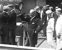 Photo # NH 18:  President Wilson waves his top hat from the deck of USS George Washington, at New York, 8 July 1919