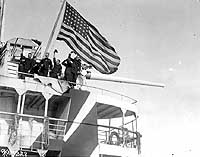 Photo # NH 43081:  Crew members wave from USS Orizaba as she sails from New York for France, 1918