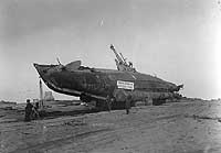 Photo # NH 53850:  USS H-3 being moved off Samoa Beach to Humboldt Bay, California, 6 April 1917