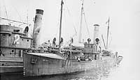 Photo # NH 89754-A:  USS Surf tied up alongside another ship, circa 1917-1919