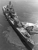 Photo # NH 98389:  USS Canberra moving into position in Hampton Roads, Va., June 1957.  Photographed by Castiglia