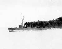 Photo # NH 98606:  USS Macdonough laying a smoke screen