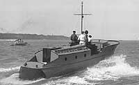 Photo # NH 100234:  Motor boat Terrier underway, probably off Milwaukee, Wisconsin.  Photographed by Brown & Rehbaum