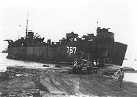 Photo # NH 102408:  USS LST-767 beached, circa 1945