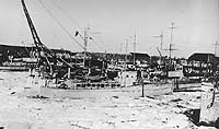 Photo # NH 102515:  USS Wemootah with several other patrol craft in an icy port, circa 1917-1919