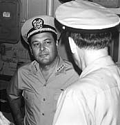 Photo # NH 103820:  Admiral James L. Holloway tours USS Truxtun, 13 October 1976.  Photographed by PH3 Jeffrey L. Aswegan