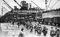 Photo # NH 104952:  USS Huron embarking homeward-bound troops at American Bassens, France, 29 June 1919