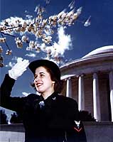 Photo # 80-G-K-13754:  WAVE saluting among the springtime cherry blossoms, in World War II Washington, D.C.