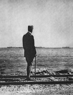 General Giraud watches as the first convoy bearing war materiel for his forces approaches North Africa