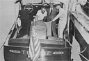 Left to Right: -- Mr. Charles E. Ford, owner of yacht 'Tempie', 
Calvin H. Dalby, Director of Public Safety, City of Norfolk, Virginia, 
and Mr. Fred Swink, inspect engine room abord yacht 'Tempie' 
berthed Southern Yacht Marine, Norfolk, Virginia