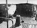 Photo 12-1: Projectile entry hole in starboard bulwark of cigarette deck