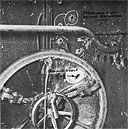 Photo 13-5: GROWLER (SS215). View of conning tower upper hatch, showing 13mm projectile hole