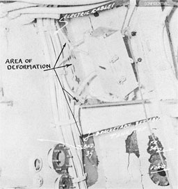 Photo 16-3: HALIBUT (SS232). View showing bukled area of after bulkhead of forward torpedo room