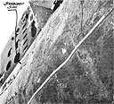 Photo 6-2. Tunny (SS232). Close view, looking up, showing depressions in pressure hull plating between frames, starboard side